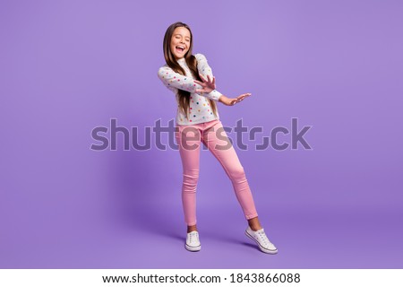 Similar – Image, Stock Photo Little girl singing dancing imitating herself a real singer