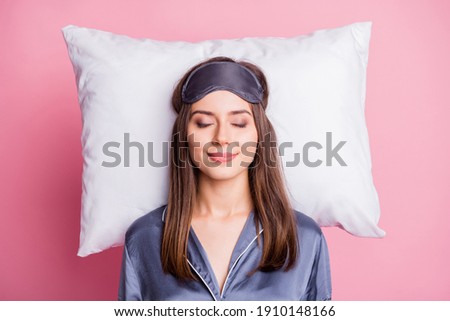 Top above high angle view photo portrait of satisfied woman sleeping on pillow isolated on pastel pink colored background