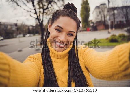 Similar – Image, Stock Photo Positive ethnic woman photographing on retro camera in city park