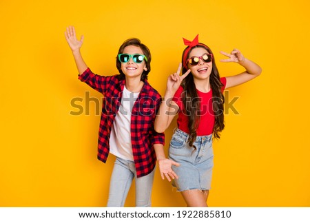 Similar – Image, Stock Photo Female palm with V-sign with rainbow bracelet