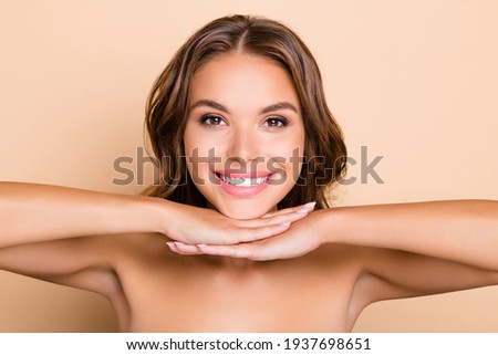 Photo of nice long hairdo optimistic lady without clothes hand face isolated on pastel beige color background Foto stock © 