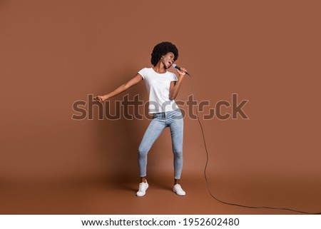 Similar – Image, Stock Photo Woman singing with microphone