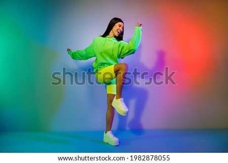 Similar – Image, Stock Photo Serene woman dancing on terrace