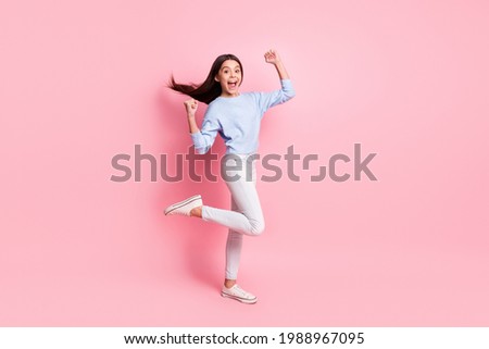 Similar – Image, Stock Photo Amazed happy little girl unwrapping birthday present party at home