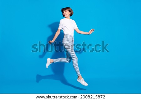 Similar – Image, Stock Photo young woman dressed in black leather and white t-shirt in the middle of the road