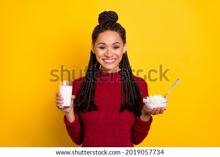 Similar – Image, Stock Photo Ethnic woman eating breakfast on bed