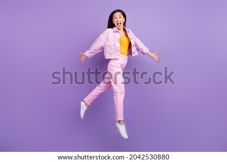 Similar – Image, Stock Photo Excited young female with flowers spreading arms in happiness