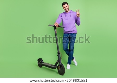Similar – Image, Stock Photo Young man with electric bicycle in the autumn park