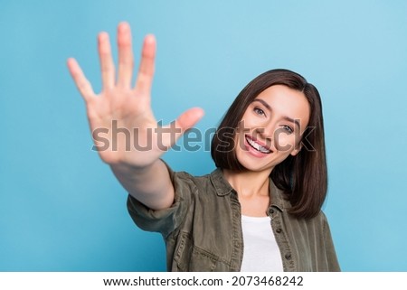 Similar – Image, Stock Photo Glad woman showing photo gesture near wall outdoors