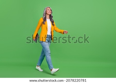 Similar – Image, Stock Photo Woman walking in green meadow near lighthouse