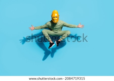 Similar – Image, Stock Photo Anonymous sportsman jumping on trial bike during workout