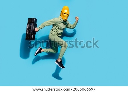 Similar – Image, Stock Photo Anonymous sportsman jumping on trial bike during workout