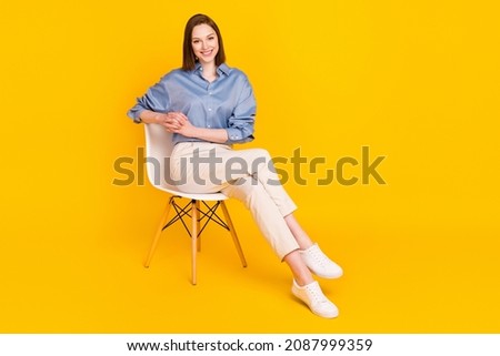 Similar – Image, Stock Photo Positive young lady sitting on bicycle on city street in sunlight