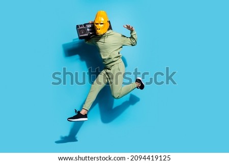 Similar – Image, Stock Photo Anonymous sportsman jumping on trial bike during workout