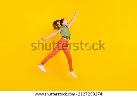 Similar – Image, Stock Photo A little girl catches soap bubbles in the park, sitting on the grass. The concept of a happy childhood