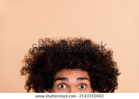 Similar – Image, Stock Photo Crop ethnic barber looking in mirror in hairdressing salon