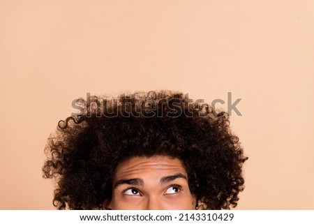 Similar – Image, Stock Photo Crop ethnic barber looking in mirror in hairdressing salon