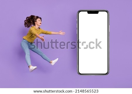 Full size profile photo of impressed lady arms catch mobile phone ads isolated purple color background Foto stock © 