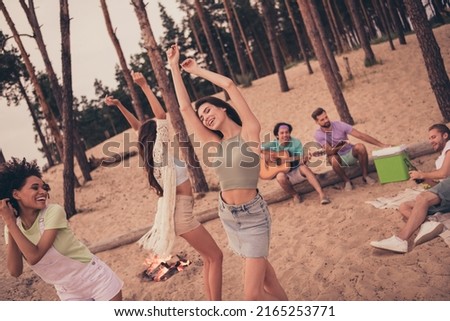 Similar – Image, Stock Photo Delighted ethnic couple playing video game together