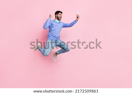 Image, Stock Photo Male in casual wear standing by a window