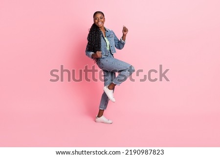 Similar – Image, Stock Photo Stylish happy black model talking on smartphone on gray background