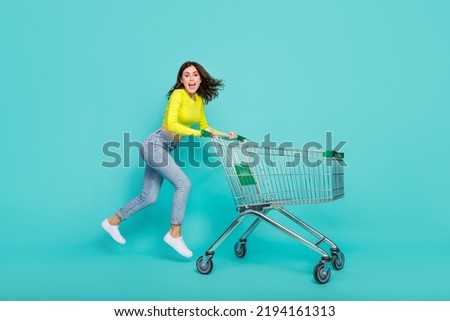 Similar – Image, Stock Photo Woman with shopping cart in the shop