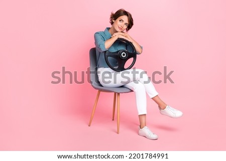 Similar – Image, Stock Photo Young attractive woman sitting at home in coxy chair drinking white wine. Treat yourself after hard day at work. Tasting wine. Yellow color in home interior. Casual everyday millennial lifestyle.