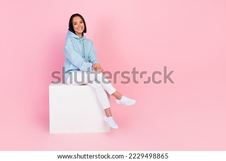 Similar – Image, Stock Photo Smiling woman dressed sportswear with rolled pilates mat in a park