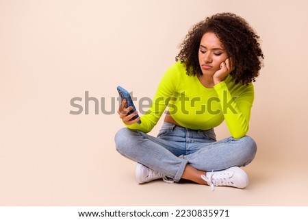 Image, Stock Photo Smiling woman browsing cellphone in city