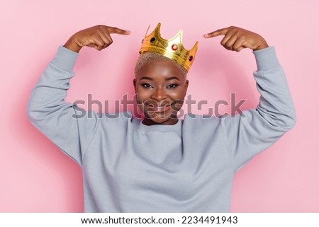 Portrait of pretty cheerful lady point fingers crown head toothy smile isolated on pink color background Foto stock © 