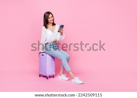 Similar – Image, Stock Photo Young and trendy woman in a sunny day sitting on the beach