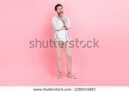 Similar – Image, Stock Photo Pensive young man in black studio with smoke