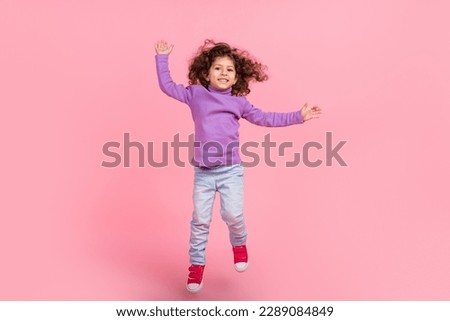 Similar – Image, Stock Photo Beautiful little girl jumping over the rope in the park on sunny day