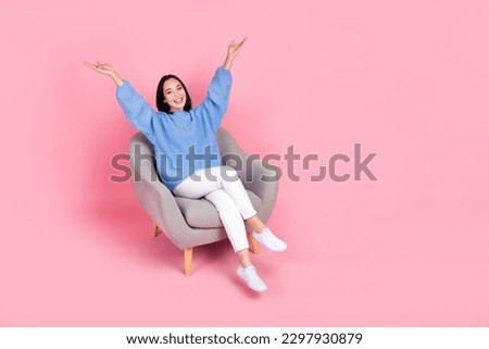 Similar – Foto Bild Trendy asiatische Frau sitzt auf Metallfass in dunklem Studio