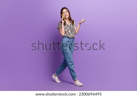 Similar – Image, Stock Photo Woman talking on cell phone and has laptop in hand