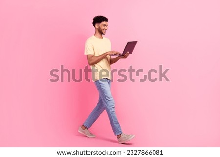 Similar – Image, Stock Photo Handsome Black Man Walking in Park and Listening to Earphones
