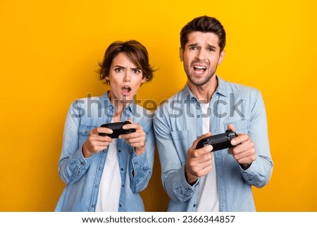 Similar – Image, Stock Photo Unhappy girl playing video game in evening time