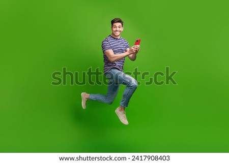 Similar – Image, Stock Photo Smiling eccentric man browsing on smartphone