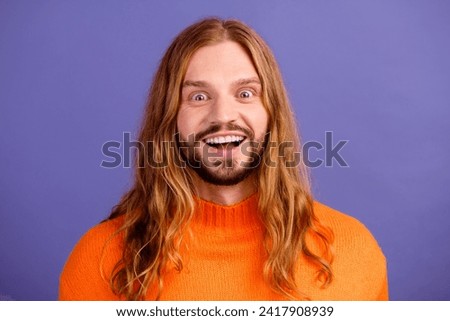 Similar – Image, Stock Photo Young blonde long haired woman standing from petrol wall in red dress smiling at camera