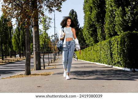 Similar – Image, Stock Photo young beautiful woman walking with her golden retriever dog on a yellow field at sunset. Nature and lifestyle outdoors. Funny dog running to her owner