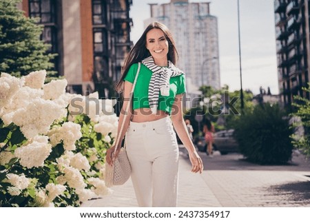 Image, Stock Photo Outdoor fashion photo of beautiful young woman surrounded by plants