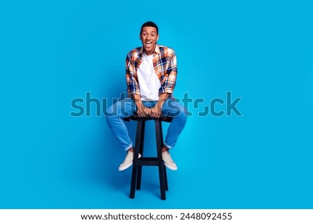 Similar – Image, Stock Photo Stylish young man sitting on concrete wall