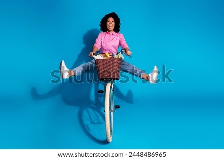 Similar – Image, Stock Photo Eccentric woman with pink hair posing near led neon lamp on teal background. Charming odd girl, nightlife concept. Modern model pop outfit, influencer lifestyle.