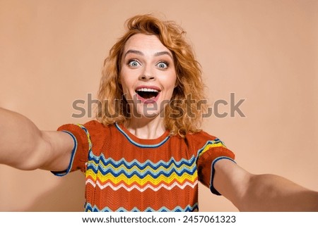 Similar – Image, Stock Photo Amazed girl making hairdo on dreadlocks of father