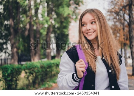 Similar – Image, Stock Photo teenager in uniform wonders about the sharpness of the sickle she is holding in her hand … and at the same time is a little worried she might hurt herself