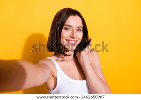 Similar – Image, Stock Photo Charming woman taking selfie on smartphone