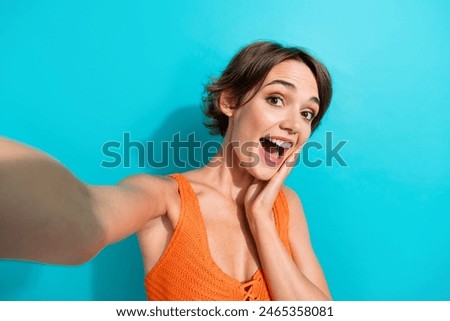 Similar – Image, Stock Photo Amazed girl making hairdo on dreadlocks of father