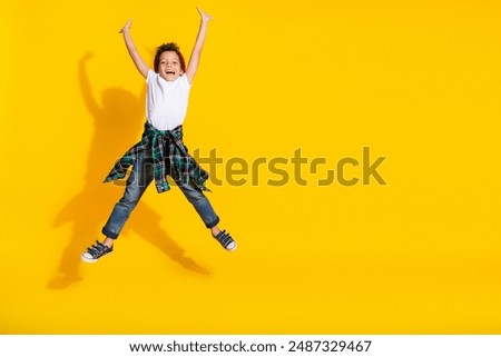 Similar – Image, Stock Photo Playful trendy young ethnic woman in deserted countryside