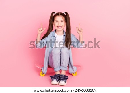 Similar – Image, Stock Photo Skaters sitting on empty rural road chatting in sunlight