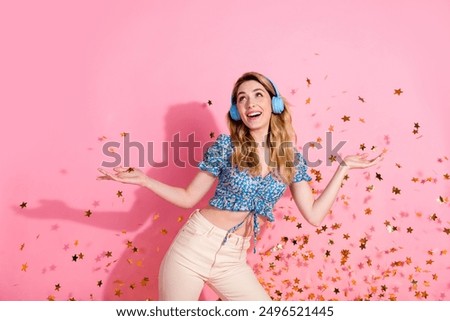 Similar – Image, Stock Photo Crop woman with headphones chatting on smartphone in evening town